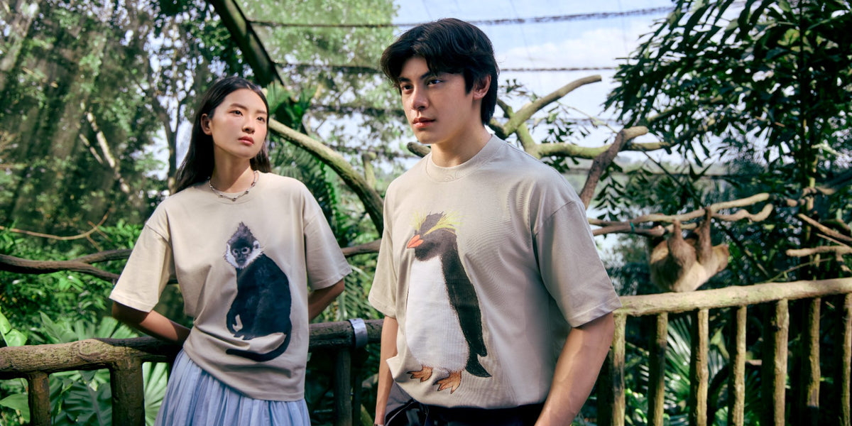 Mandai @ DORS campaign: two models wearing Mandai collection tees among foliage at Mandai Wildlife Reserve