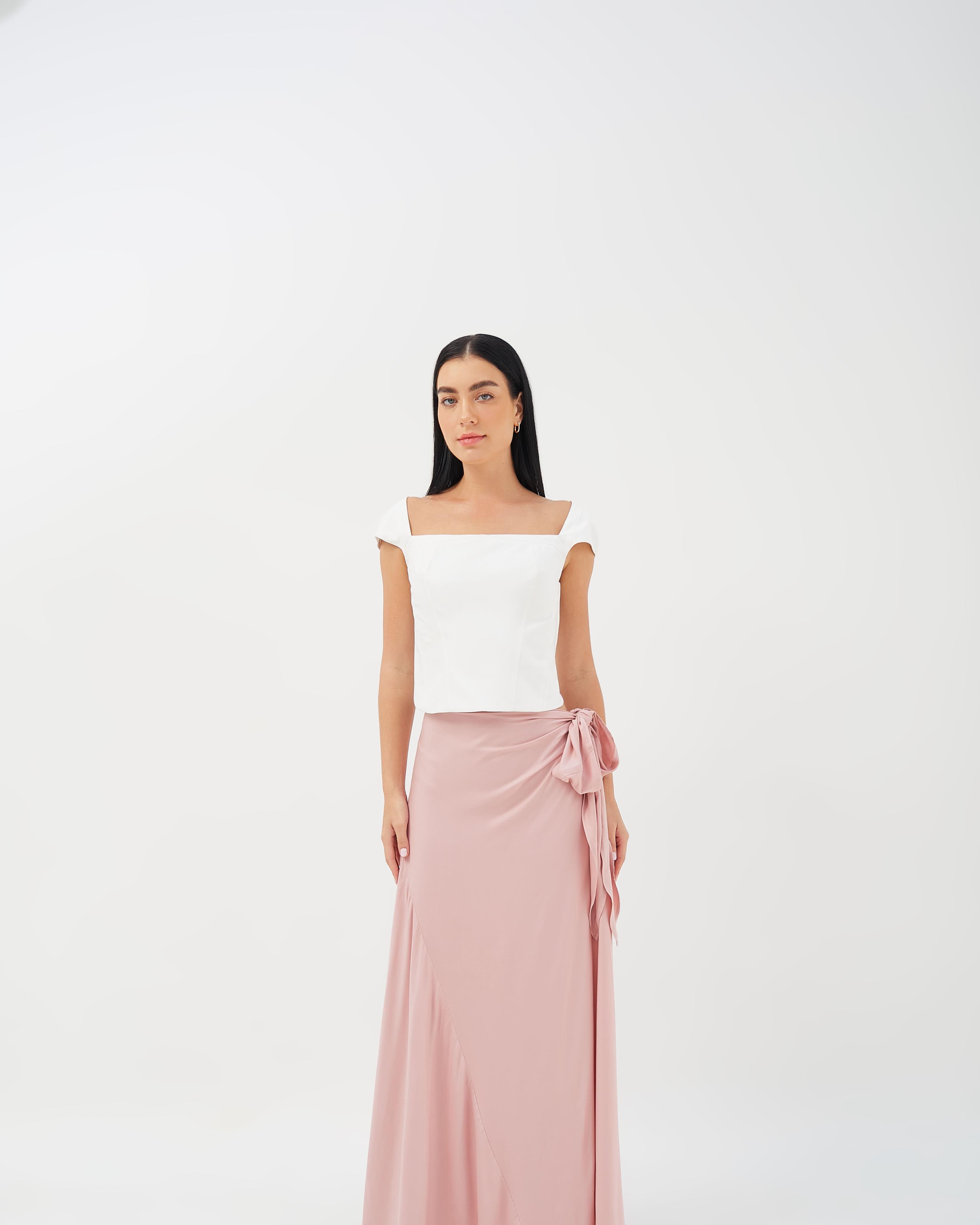 Wrap skirt featuring a relaxed fit and asymmetric cut, ideal for versatile styling.