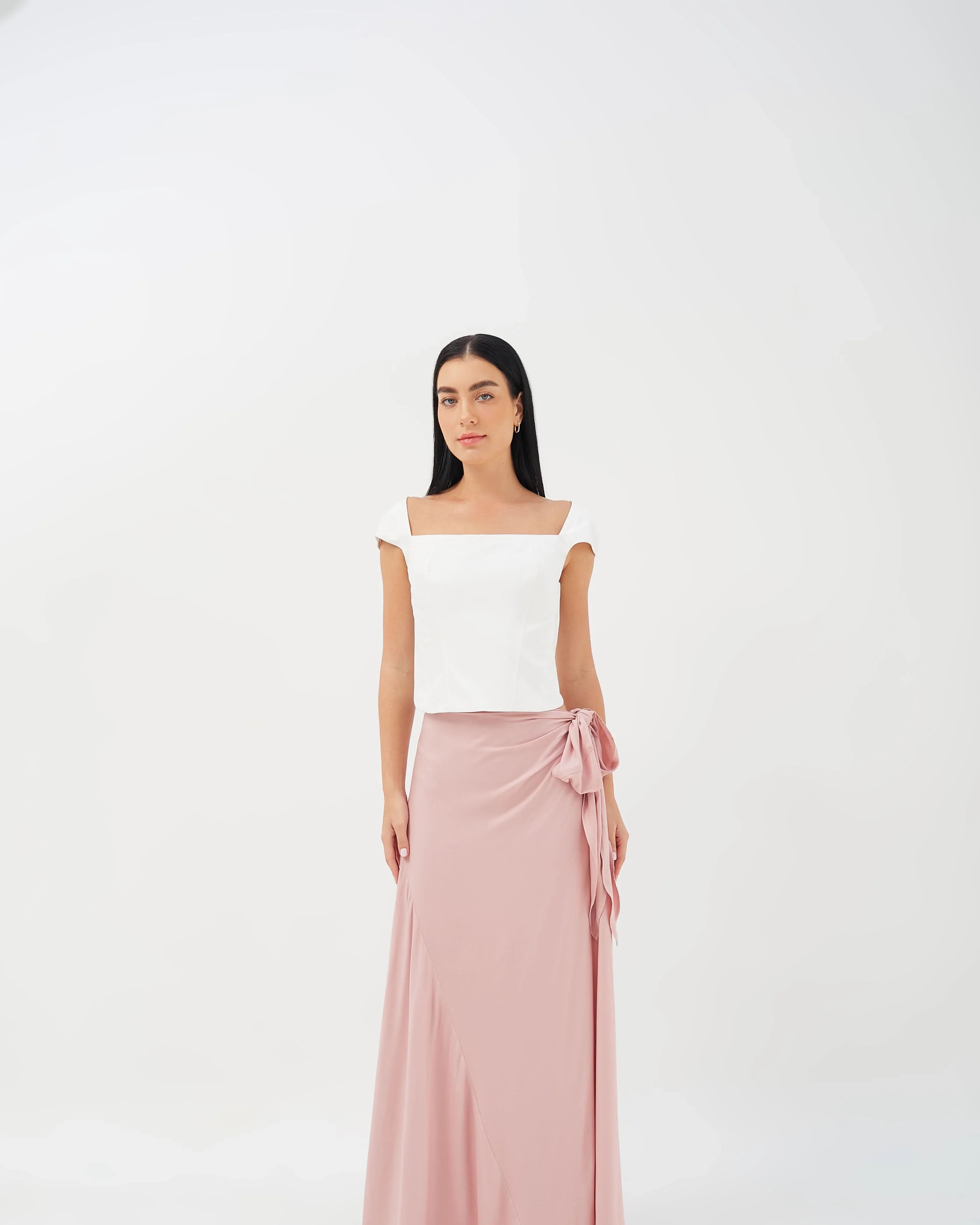 Wrap skirt featuring a relaxed fit and asymmetric cut, ideal for versatile styling.