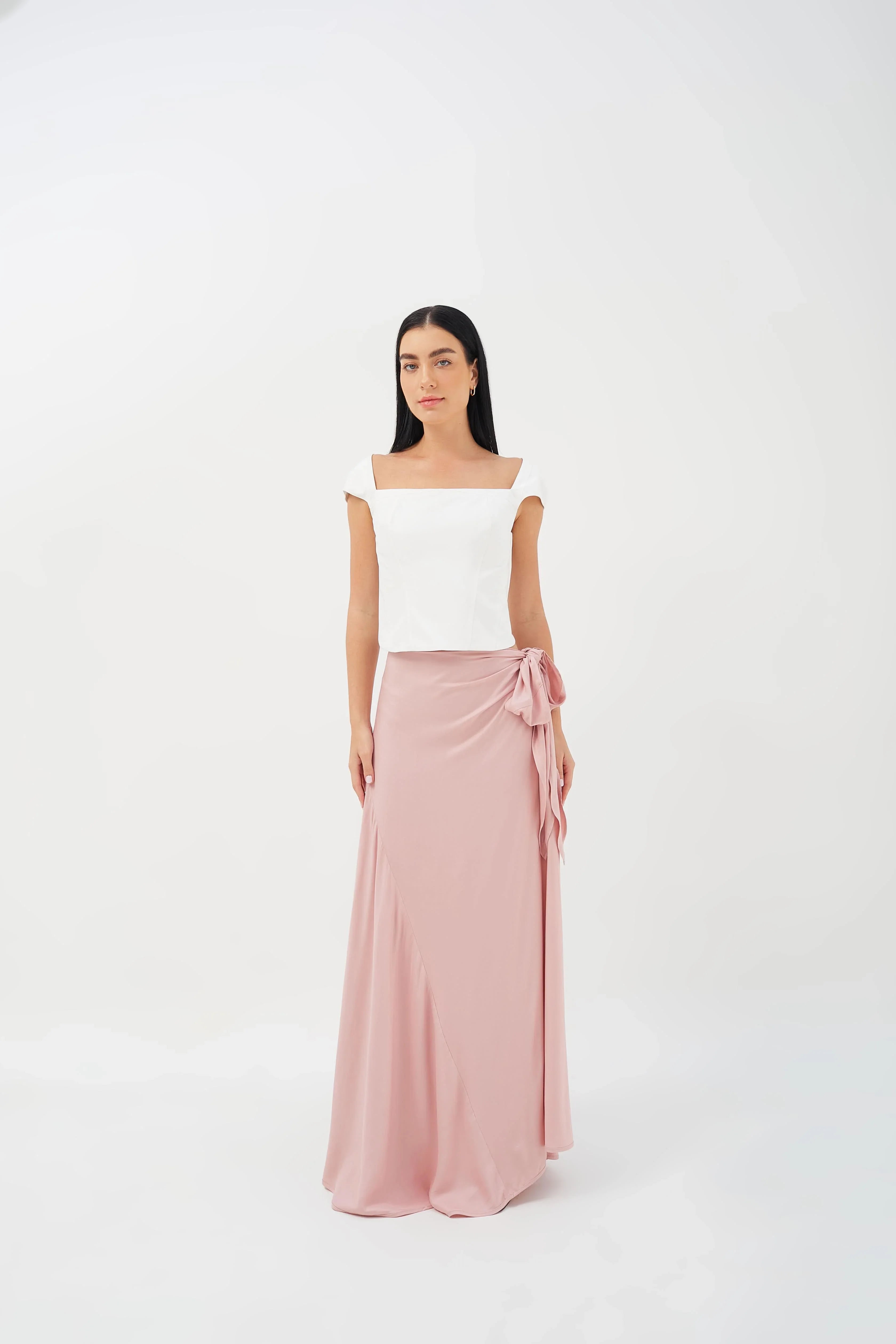 Wrap skirt featuring a relaxed fit and asymmetric cut, ideal for versatile styling.