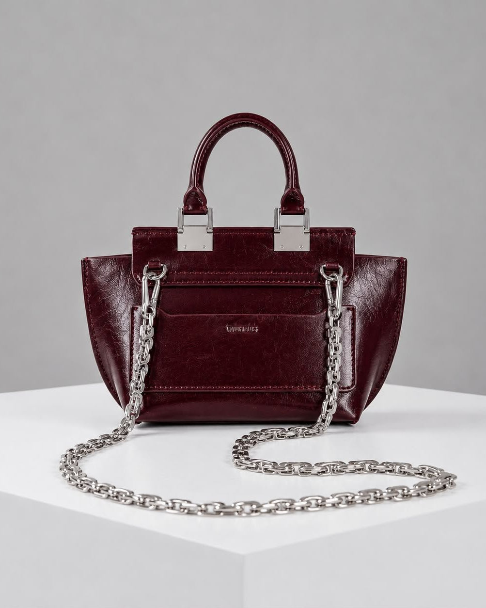 WU HAUS | Le Bon 14 Plum Leather Top Handle Bag