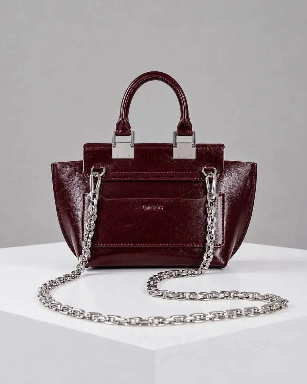 WU HAUS | Le Bon 14 Plum Leather Top Handle Bag