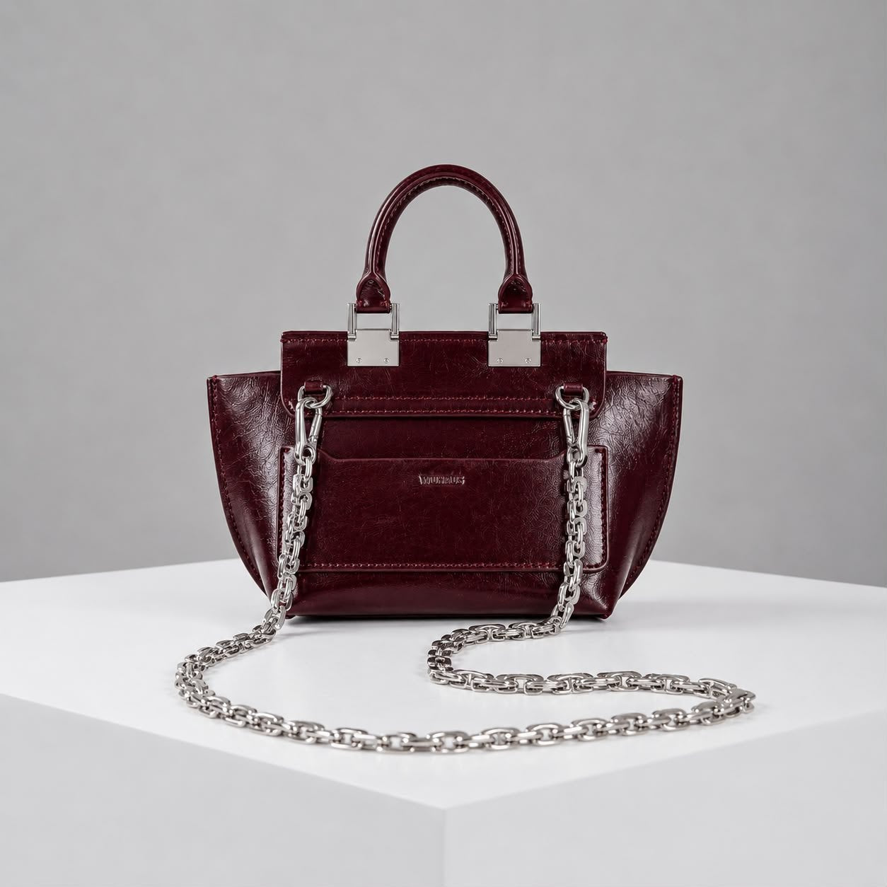 WU HAUS | Le Bon 14 Plum Leather Top Handle Bag