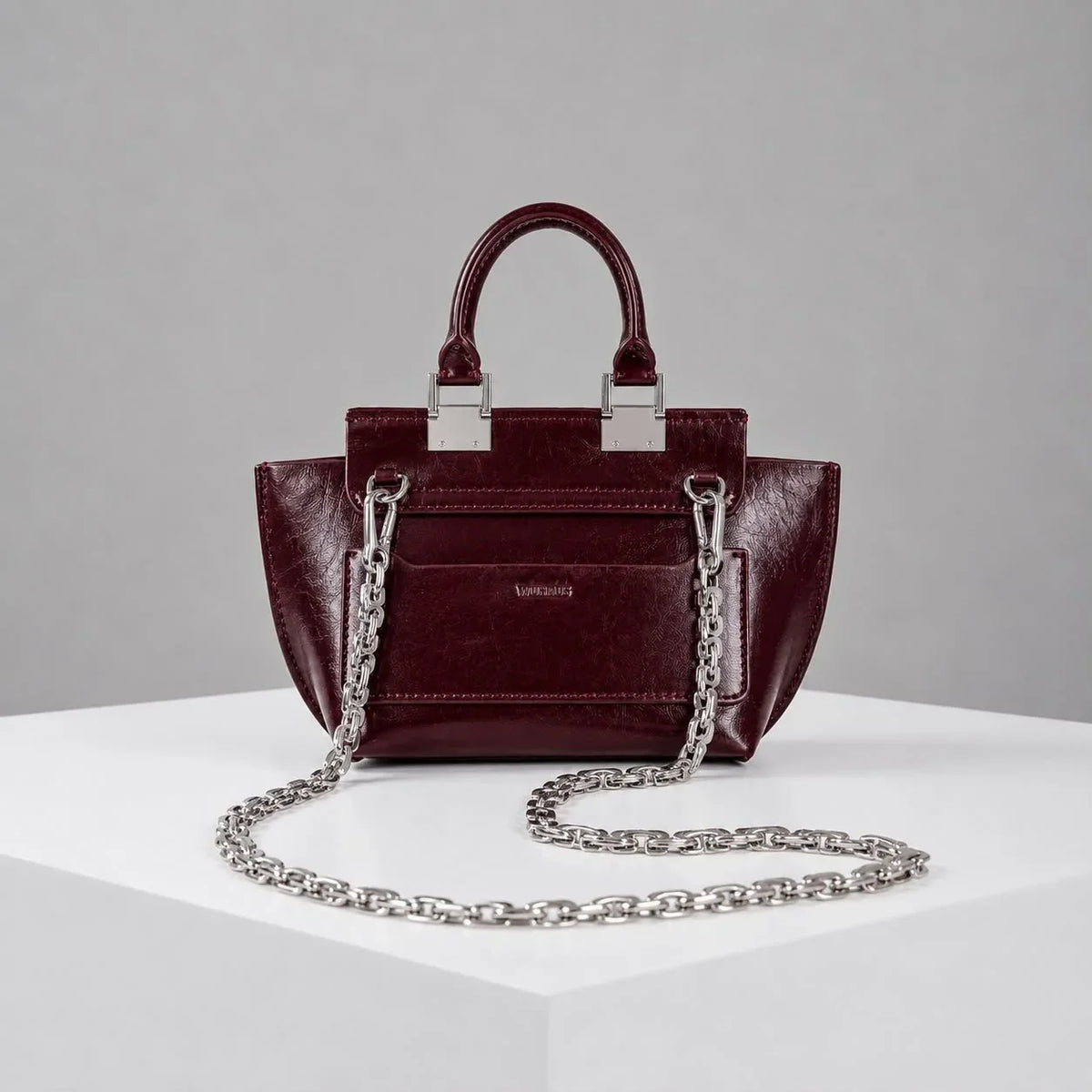 WU HAUS | Le Bon 14 Plum Leather Top Handle Bag