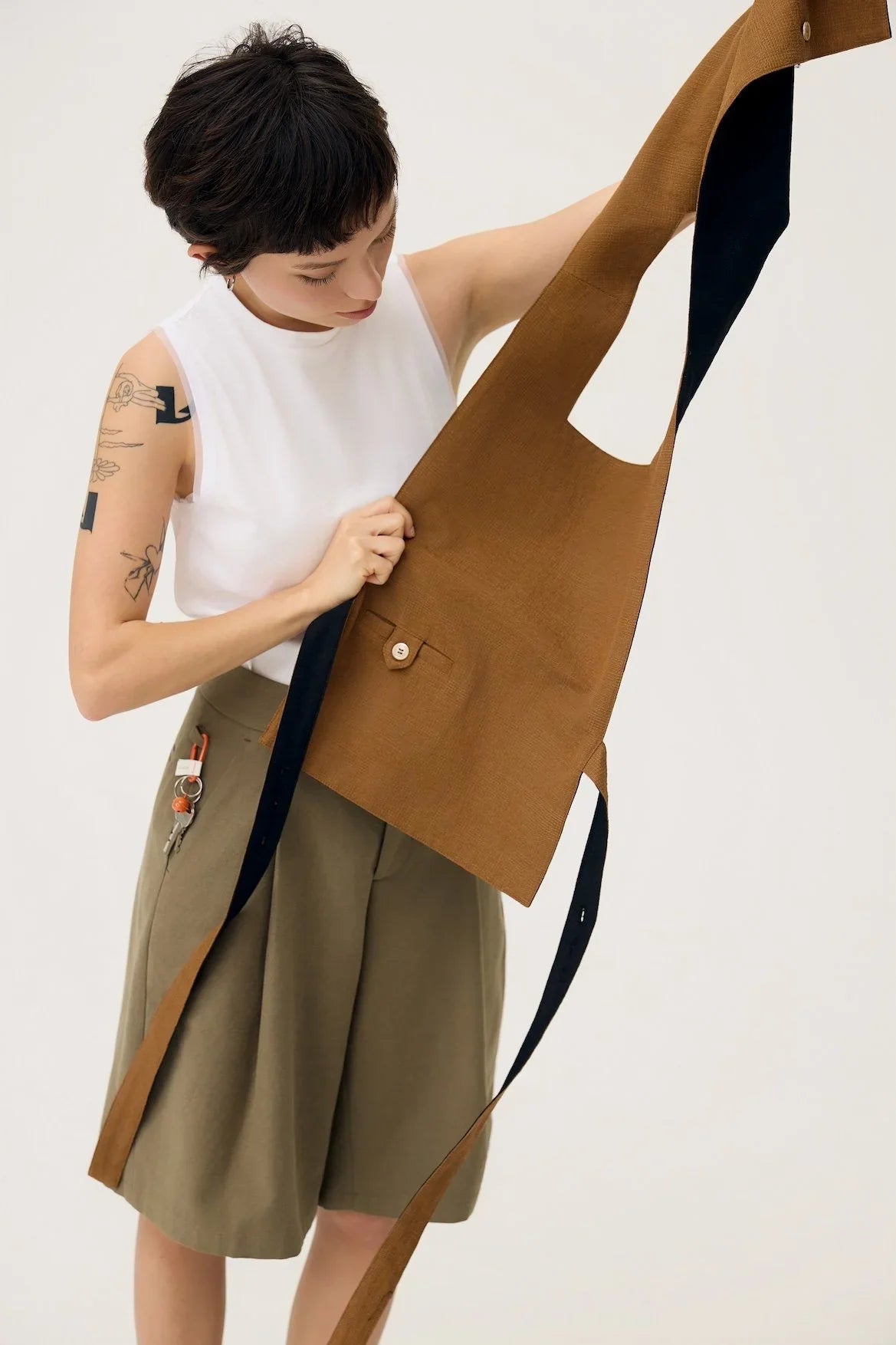 3EIGHTH | GYAKU 2-Way Reversible Vest in Black & Caramel