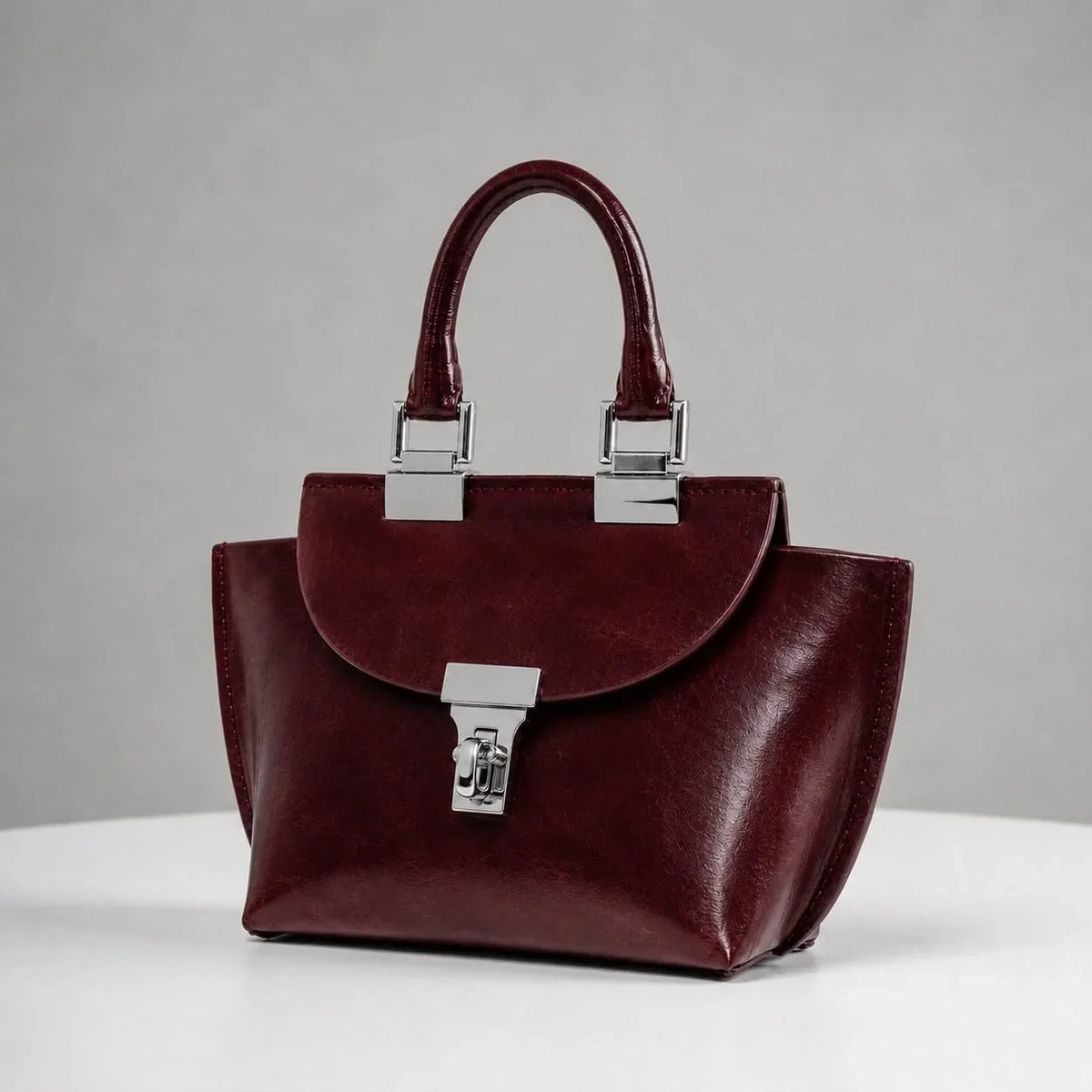 WU HAUS | Le Bon 14 Plum Leather Top Handle Bag