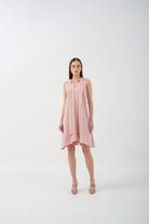 A-line dress with bow tie neck and asymmetrical hem, perfect for casual styling.