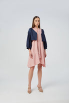 Cropped denim jacket with three-quarter balloon sleeves and a relaxed fit.