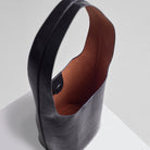 WU HAUS | Vessel Black Lizard Cow Embossed Bucket Bag