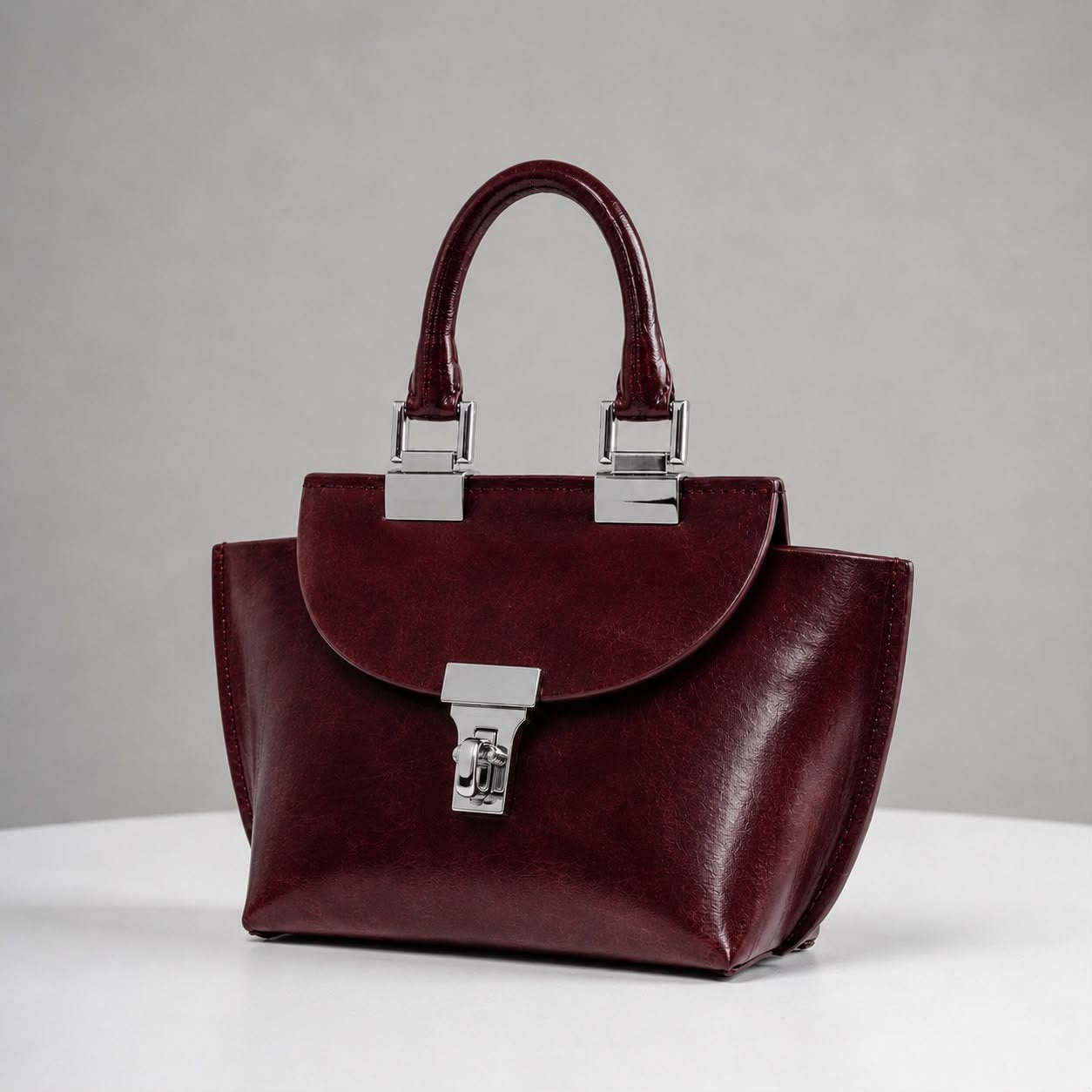 WU HAUS | Le Bon 14 Plum Leather Top Handle Bag